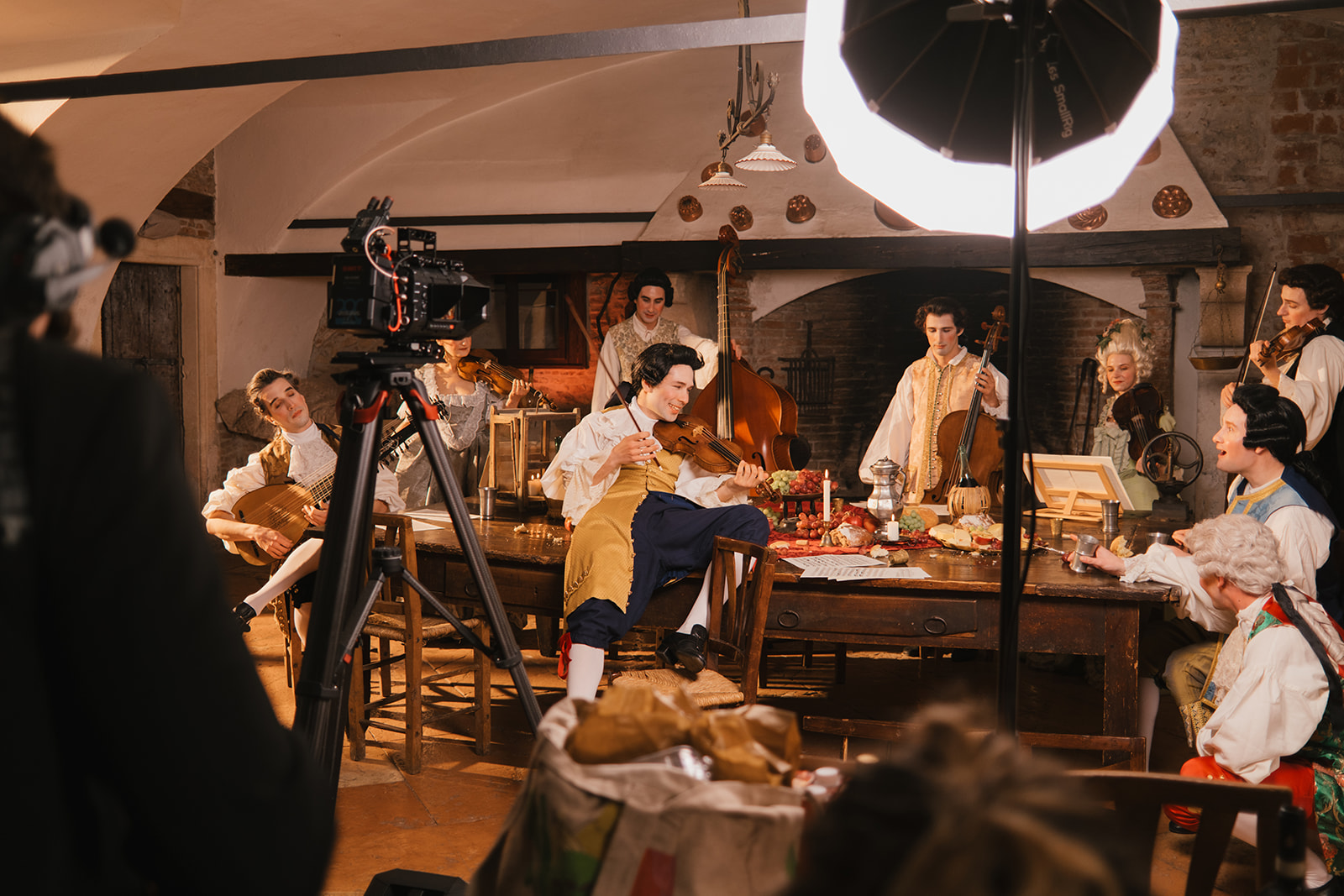 Ensemble in candlelit kitchen